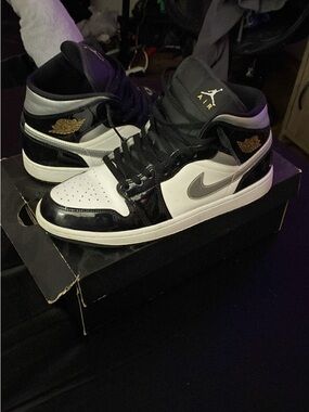 Jordan Mid-Top Sneakers in Black, White & Gold Accents